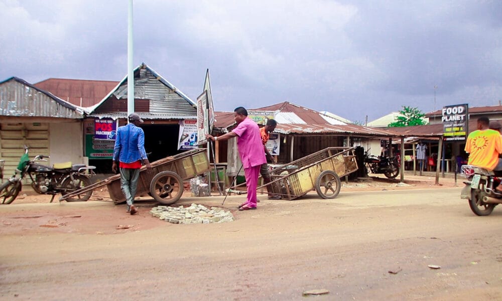 Chief Okpako Moves To Repair Failed Portions Of Abraka Roads Close To Campus Gate