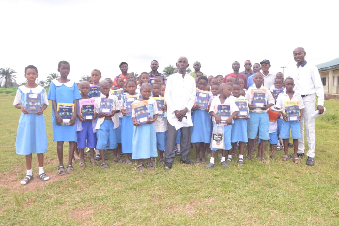 Nuelstree Foundation Donates Books To Ugono Primary School Pupils, Cash To Staff