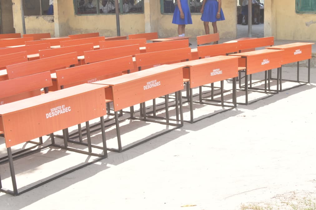 Ovbije Takes Distribution Of Chairs, Desks To Schools In Ughelli North LGA
